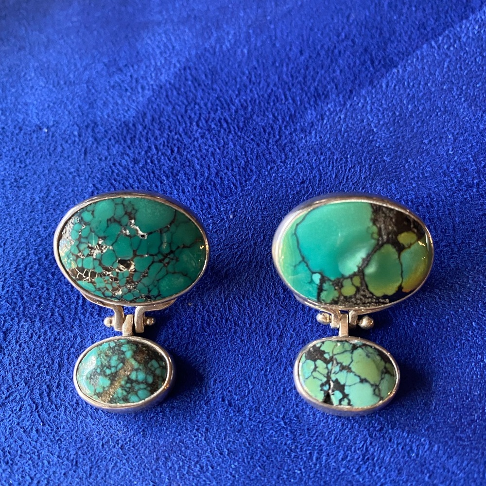 Sterling silver and turquoise dangle earrings.
